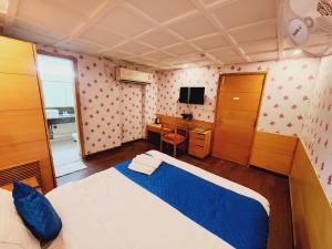 Letto o letti in una camera di Hotels Daffodils