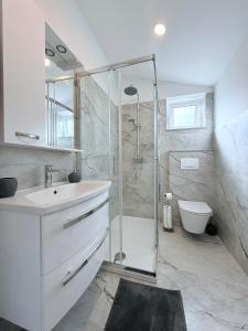 Koupelna v ubytování Apartment ONE + 25 fotografií
