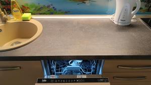 Η κουζίνα ή μικρή κουζίνα στο Apartament 2 camere
