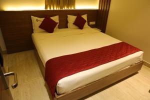 Postel nebo postele na pokoji v ubytování Hotel Amoha