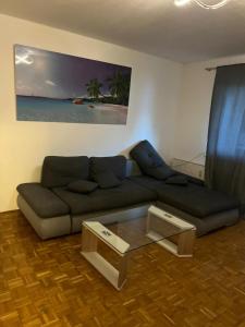 Posezení v ubytování Gemütliche Wohnung in Leonding