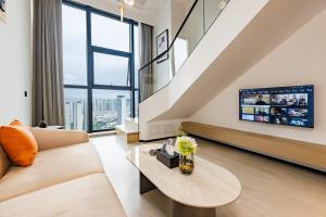 TV a/nebo společenská místnost v ubytování Yulan B&B