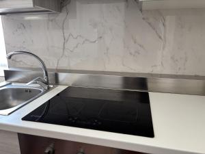 Kuchyň nebo kuchyňský kout v ubytování Porto Cesareo - Appartamenti e camere