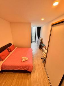 The Podium Kuching Luxury 6pax 3BR HFloor Facing Aeon客房内的一张或多张床位