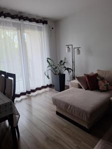 Ένα ή περισσότερα κρεβάτια σε δωμάτιο στο Apartament Kaczmarka PARK