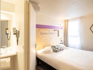 Koupelna v ubytování greet Hotel Beaune