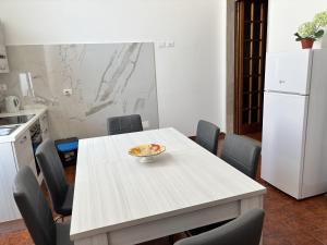 Kuchyň nebo kuchyňský kout v ubytování Porto Cesareo - Appartamenti e camere