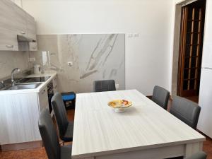 Kuchyň nebo kuchyňský kout v ubytování Porto Cesareo - Appartamenti e camere