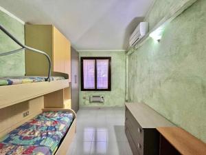 Ένα ή περισσότερα κρεβάτια σε δωμάτιο στο Casa vacanza San Teodoro