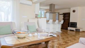a living room with a table with a bowl on it at VILLA Rübezahl in Benidorm