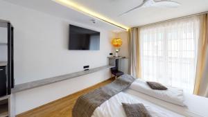 Hotel Adler客房内的一张或多张床位