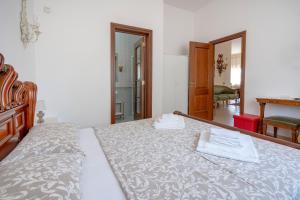 Postel nebo postele na pokoji v ubytování Bnb Villa Lucia