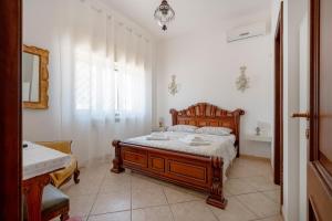 Postel nebo postele na pokoji v ubytování Bnb Villa Lucia