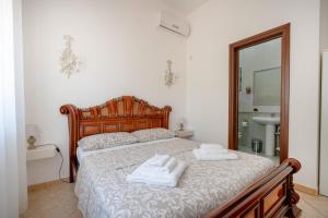 Postel nebo postele na pokoji v ubytování Bnb Villa Lucia