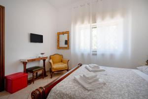 Postel nebo postele na pokoji v ubytování Bnb Villa Lucia