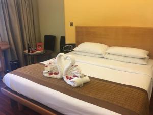 Voodi või voodid majutusasutuse Hotel Hight le mount toas