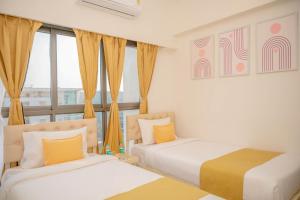 Voodi või voodid majutusasutuse Hotel Hight le mount toas
