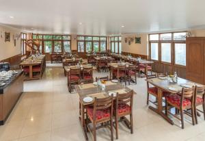 Restaurace v ubytování The Cardamom Thekkady