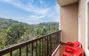 Balkón nebo terasa v ubytování The Cardamom Thekkady