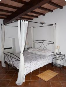 Postel nebo postele na pokoji v ubytování Agriturismo Podere Forano