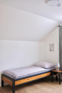 Postel nebo postele na pokoji v ubytování Klidovka Sumava