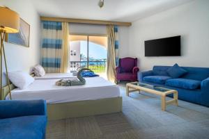 TV a/nebo společenská místnost v ubytování Marina Eye Resort - Alamien Marina Plaza