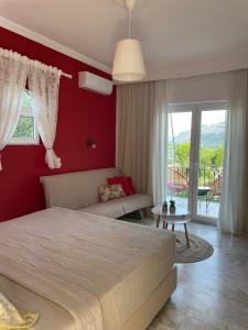 Posteľ alebo postele v izbe v ubytovaní ILEKTRA Apartments Blue & Red + 37 fotografií