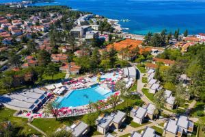 an aerial view of a resort with a swimming pool at Apartments Park Plava Laguna in Poreč