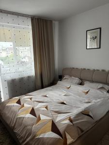 Postel nebo postele na pokoji v ubytování Sweet Stay Central