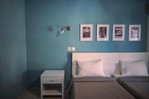 Cama ou camas em um quarto em Hotel Kalloni