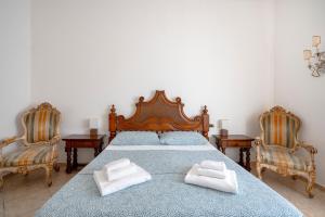 Postel nebo postele na pokoji v ubytování Bnb Villa Lucia