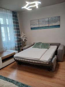 Posteľ alebo postele v izbe v ubytovaní Soda apartman