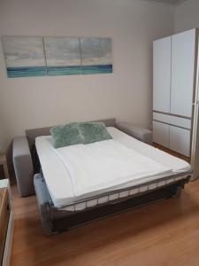 Posteľ alebo postele v izbe v ubytovaní Soda apartman