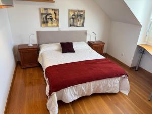 En eller flere senge i et værelse på Impresionante Casa a Pie de Playa