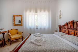 Postel nebo postele na pokoji v ubytování Bnb Villa Lucia