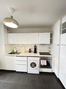 Η κουζίνα ή μικρή κουζίνα στο Soh Rent Strasbourg Appartement proche des halles