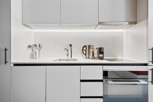 Kuchyňa alebo kuchynka v ubytovaní Ariv Design Hotel Zug