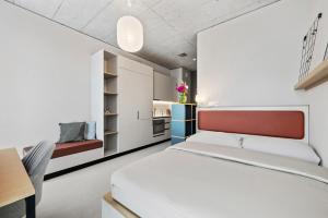 Posteľ alebo postele v izbe v ubytovaní Ariv Design Hotel Zug