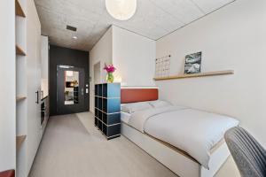 Posteľ alebo postele v izbe v ubytovaní Ariv Design Hotel Zug