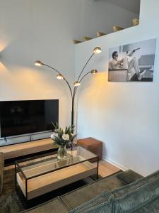 Μια τηλεόραση ή/και κέντρο ψυχαγωγίας στο LOFT DE LA PLAGE - à 30 m de la mer