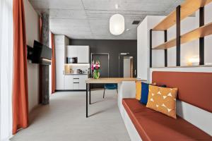 Kuchyňa alebo kuchynka v ubytovaní Ariv Design Hotel Zug