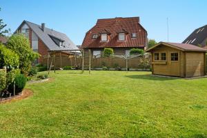 Zahrada ubytování Ferienhaus Deichzeit