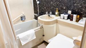 Koupelna v ubytování HOTEL LiVEMAX BUDGET Shinbashi