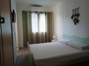 Postel nebo postele na pokoji v ubytování Astra Solea