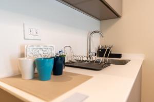 Η κουζίνα ή μικρή κουζίνα στο Bovio28studios +106 φωτογραφίες