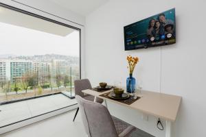TV o dispositivi per l'intrattenimento presso Campus Lugano 45 wonderful Smart Suites in the university area
