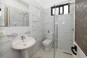 Koupelna v ubytování Hotel Fama