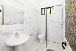 Koupelna v ubytování Hotel Fama