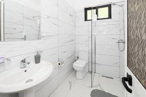 Koupelna v ubytování Hotel Fama
