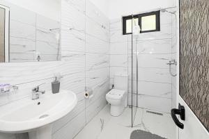 Koupelna v ubytování Hotel Fama